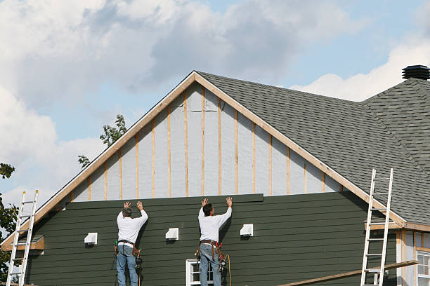 Professional Siding technician working in Charlestown, MA